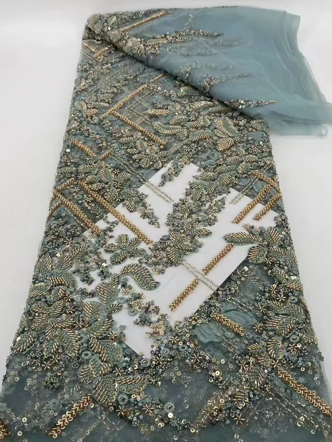 

High-quality African lace fabric, luxurious French sequined chiffon, and Nigerian embroidered mesh lace fabric for dress sewing