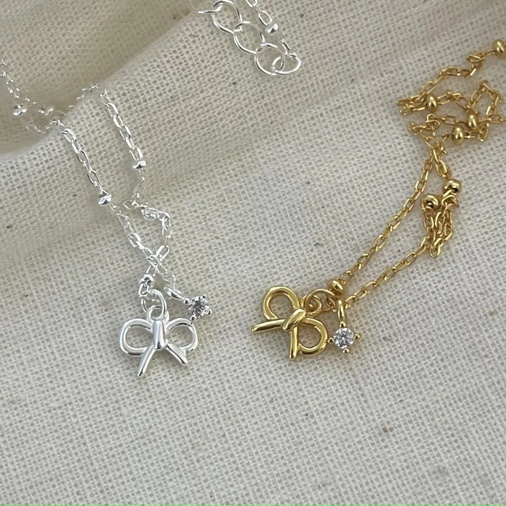 

CCFJOYAS 925 Sterling Silver Vintage Bowknot Necklace for Women Simple INS Light Luxury niche design Collarbone Chain