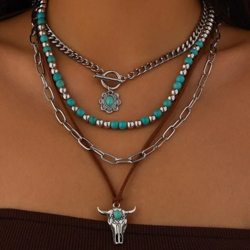 

Retro imitation turquoise cow head collarbone exotic ethnic style cactus cowboy hat stacked with beaded necklace