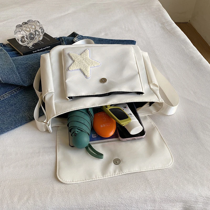 2025 حقيبة كروسبودي أنثى النمط الياباني تصميم متخصص فئة النجوم حقيبة كتف الترفيه حقيبة ساعي البريد للنساء