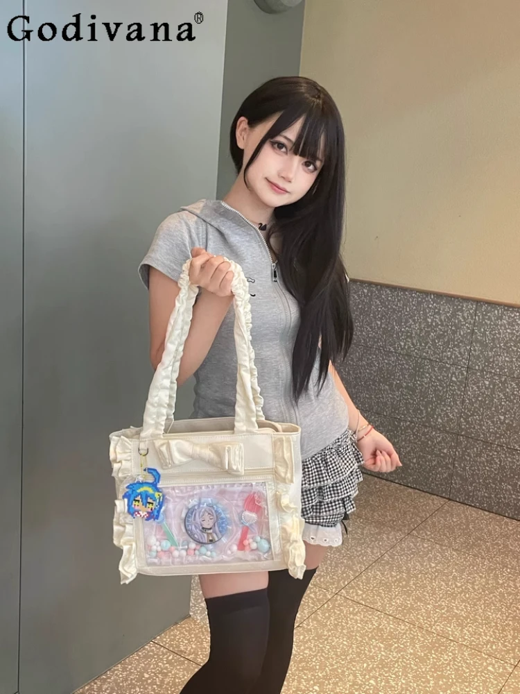 

Japanese Sweet Girl Black Fungus Edge Large Capacity Pain Bag Cute Bow Daily Commuter Baby Bag Versatile Portable Shoulder Bag