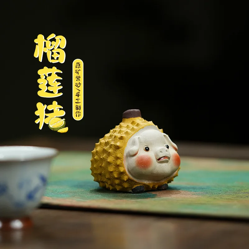 

Purple sand tea pet durian pig decoration hand handle fruit tea play can raise lovely tea ceremony tea table tea set lovely