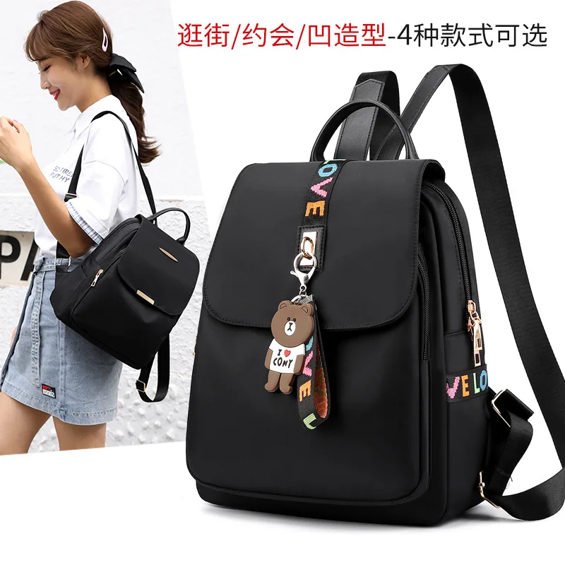 حقيبة ظهر عصرية بسيطة لعام 2025 بسعة كبيرة من قماش أكسفورد خفيفة الوزن حقيبة كتف للسفر على طراز الشارع كاجوال بلون نقي