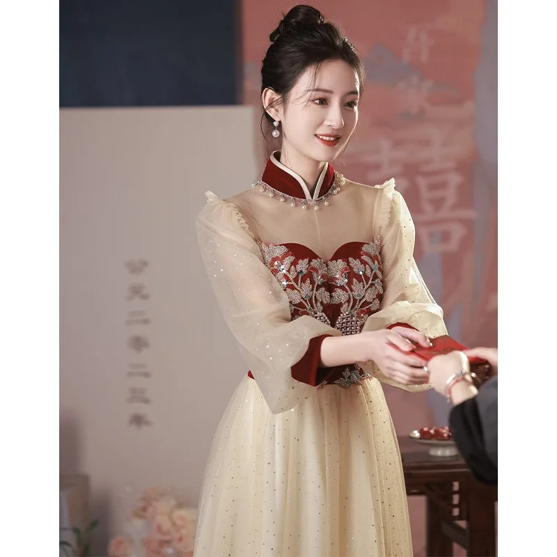 

Chinese Wedding Dress 2025 New Wine Red Knot Embroidered Pearl Stand Collar Long Sleeve Zipper Back Formal Dress Women Elegant