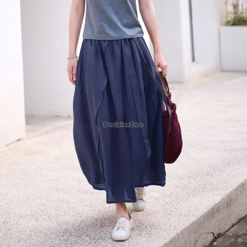 تنورة نسائية غير رسمية فضفاضة جديدة ربيعية طويلة لعام 2025 من القطن والكتان بتصميم غير متماثل بنصف برعم الزهور