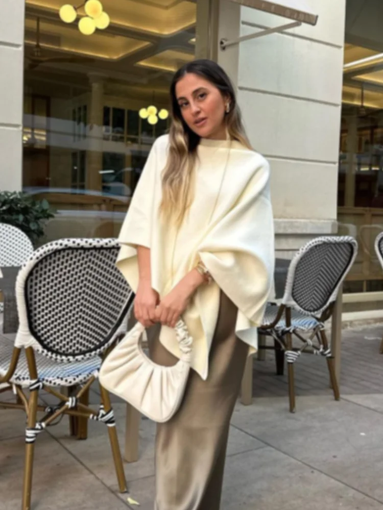 새로운 니치 디자인의 불규칙 니트 숄 여성 스웨터 루즈핏 우아한 케이프 미니멀리스트 스웨터 여성 상의 케이프