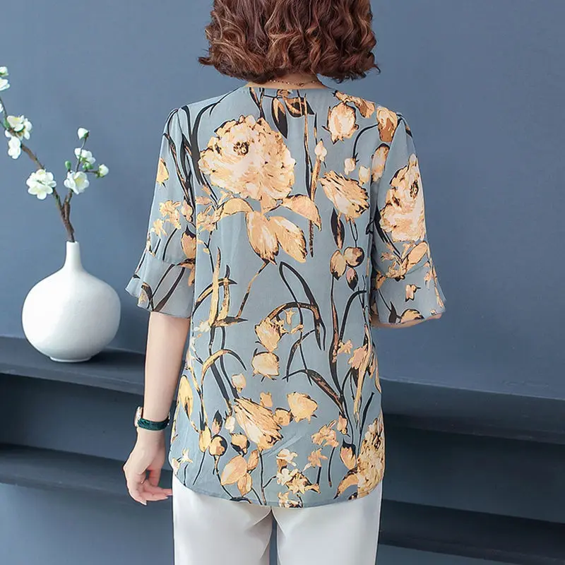 Camiseta con cuello en V y estampado de flores y plantas para mujer, Jersey ajustado de media manga con cinturón de gasa para viaje, moda de verano,