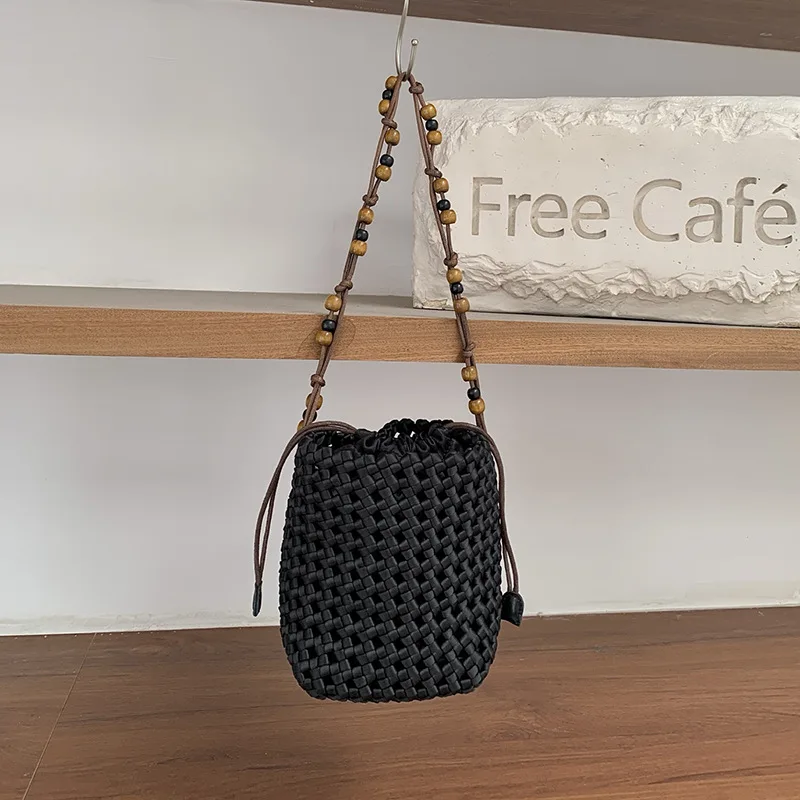 

Nylon hand-woven bucket bag 2025 new niche design satin hollow vacation mini fashion women's chain one-shoulder crossbody bag