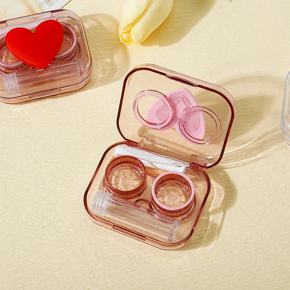คอนแทคเลนส์กรณีสีชมพูโปร่งใส Love Bow คอนแทคเลนส์สาวความงามแบบพกพานักเรียนกล่อง Eye Care กล่องคอนเทนเนอร์