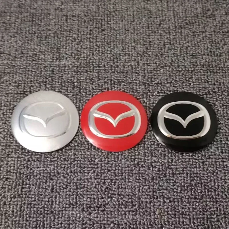 60 مللي متر 65 مللي متر سيارة عجلة مركز محور قبعات ملصق لمازدا MS 3 6 GH Atenza CX5 CX5 CX3 CX9 RX7 RX8 Axela اكسسوارات السيارات الخارجية