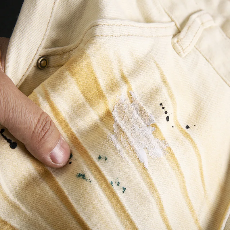 Graffiti splashed ink patchwork jeans men's beige high street cool casual fashion elastic zipper slim fit small leg pants