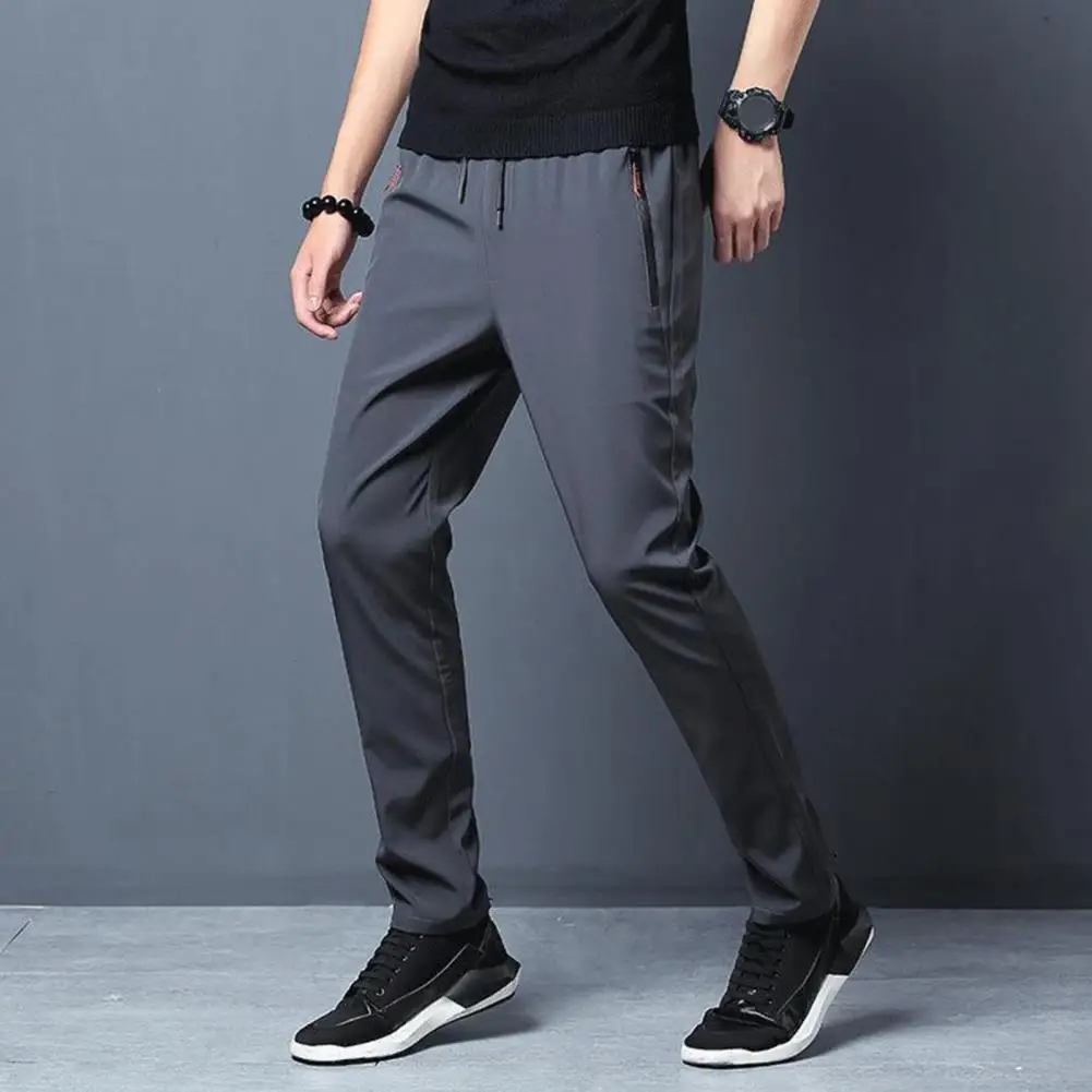 

Stretchy Men Trousers Zippered Pocket Trousers for Men Quick-drying Men's Sport Pants with Side Zippered Pockets for Gym