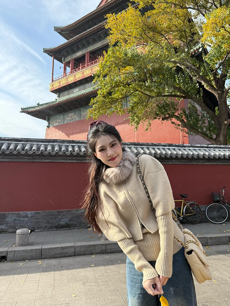 

Новинка зимы 2025: Элитный вязаный комплект с накидкой, уникальный красивый свитер и полосатая юбка для женщин