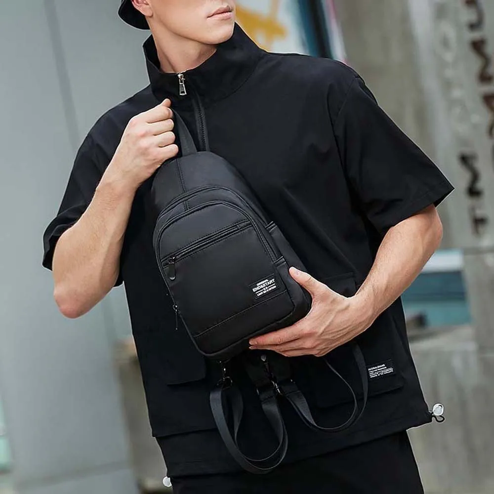 Oxford stoffen zwarte herenrugzak Zwarte waterdichte schoudertas met grote capaciteit Multifunctioneel anti-spatwater