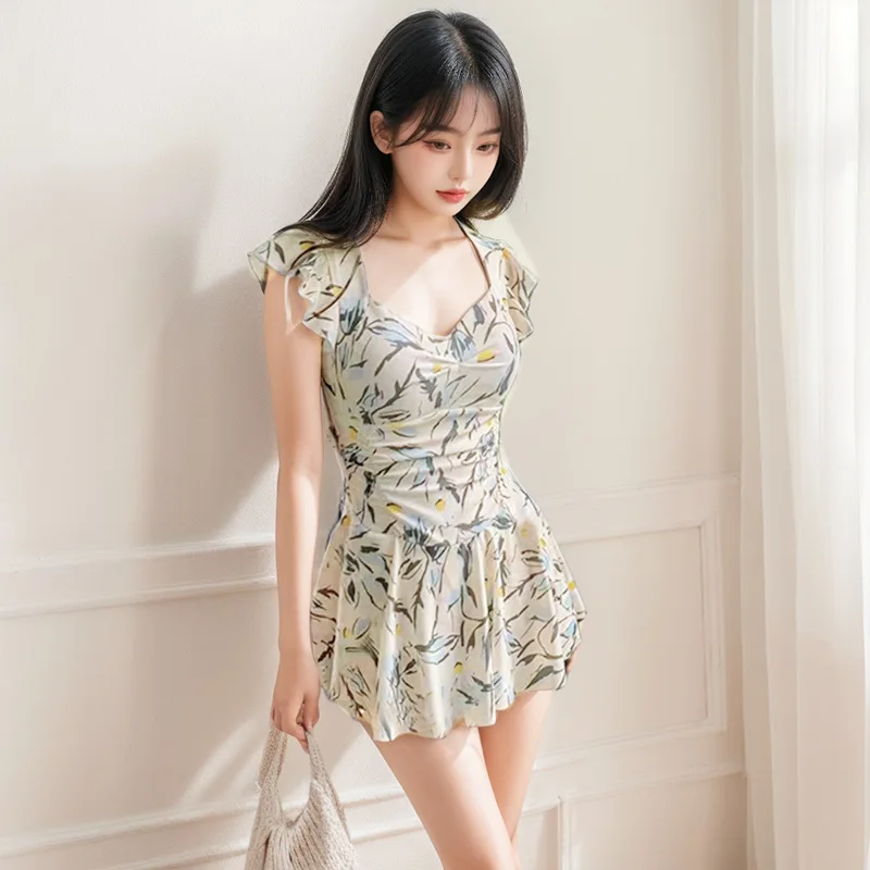 ชุดว่ายน้ำแฟชั่นเกาหลีสุดเซ็กซี่ ลายดอกไม้ระบาย ชุดว่ายน้ำวันพีซ ชุดเดรสสั้นจับจีบ ชุดบิกินี่แบบกางเกงขาสั้น ชุดว่ายน้ำเสริมฟองน้ำ ชุดว่ายน้ำแบบแทงกินี่