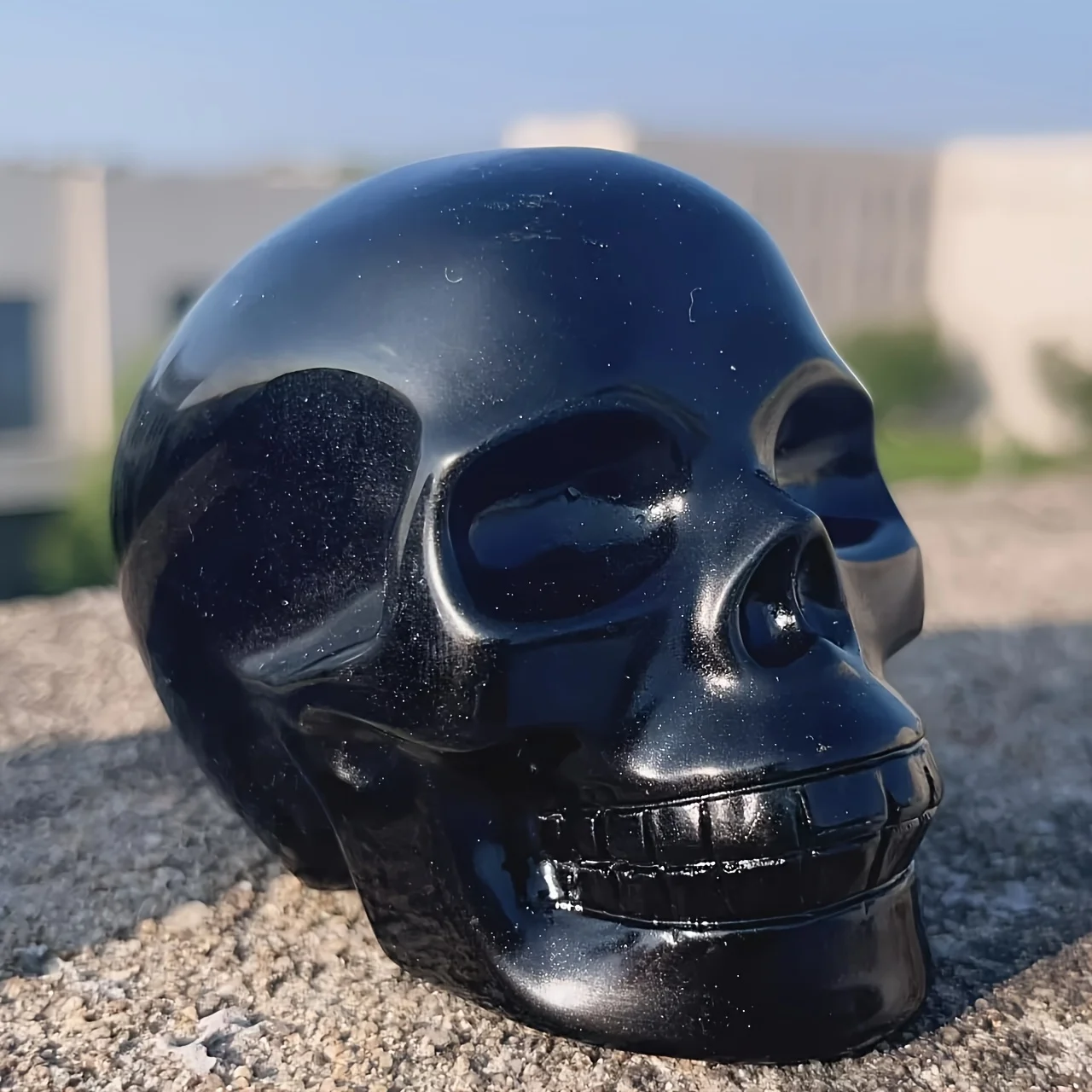 A beautiful obsidian skull—a decorative stone for home decor and the perfect gift for a loved one