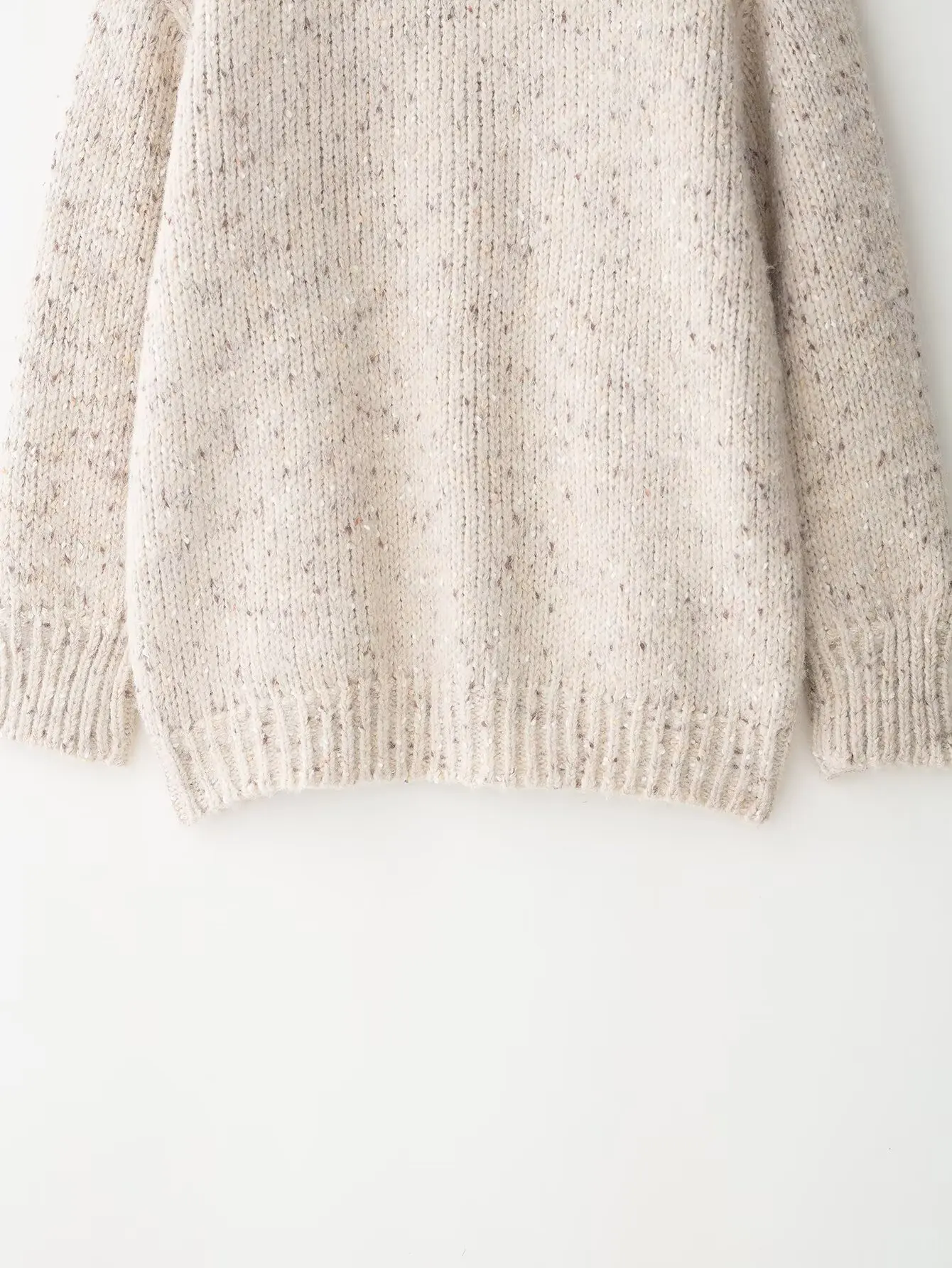 Nowa damska odzież 2025, styl europejski i amerykański, modna dzianinowa luźna kurtka z dekoltem w serek, długim rękawem i drobnymi kropkami.