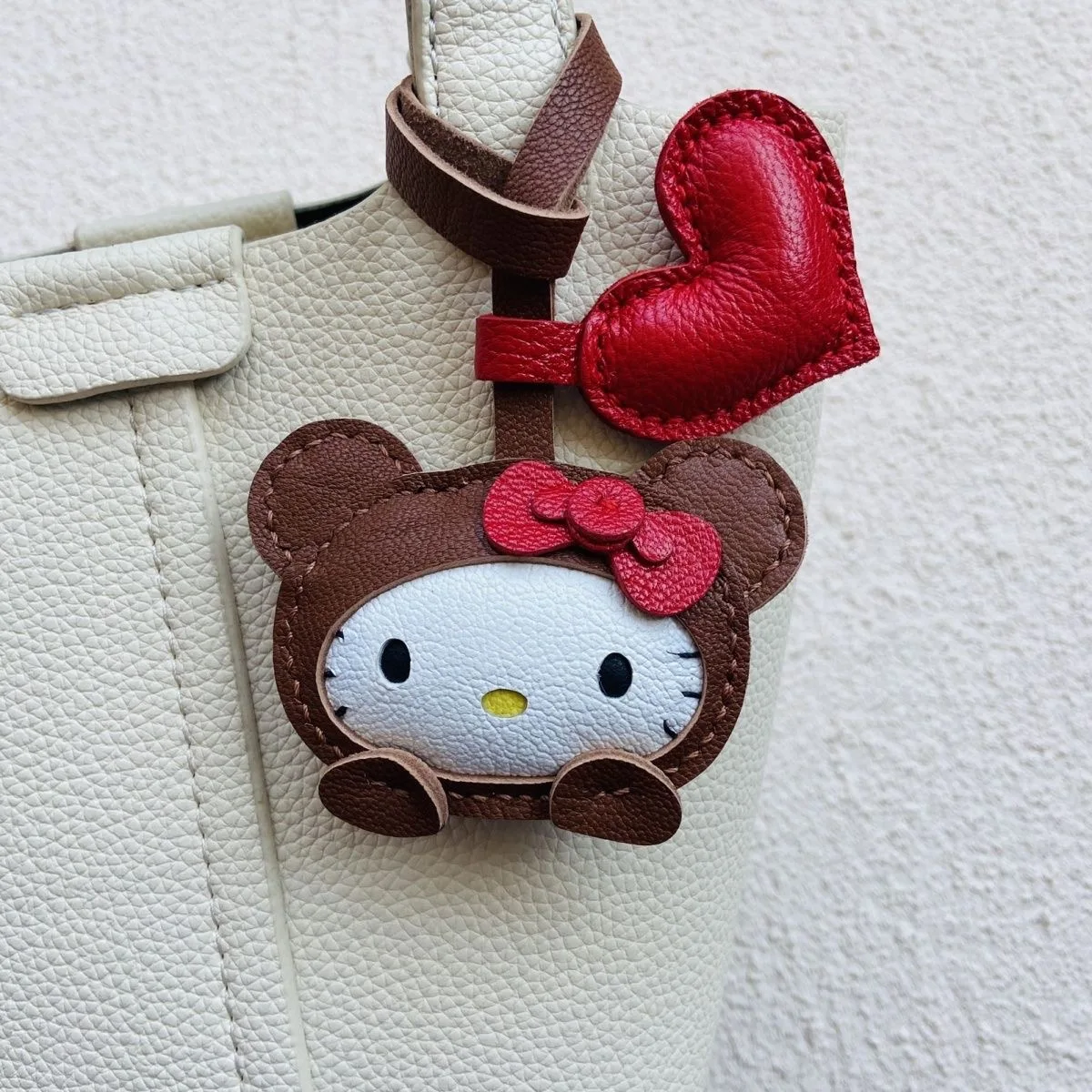 Hot Sale Handmade Leather Goods Sheep Cross Dressing Hello Kitty Handbag Pendant Cute Car Keychain Girl'S Gift Birthday Cute