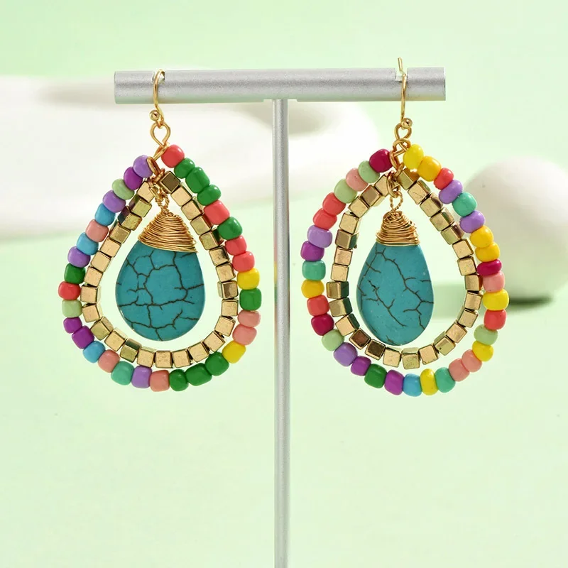 

Beaded earrings Water drop Hand knitting Natural stone Design Bohemia Alloy Tide Simple Colour Originality Rice bead earrings