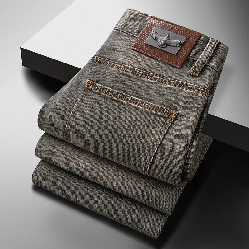 

Новые мужские джинсы из денима, повседневные, универсальные, с высокой талией, облегающие, из высокотехнологичной ткани без стрейча, весенняя новинка от Guangzhou Xinta...