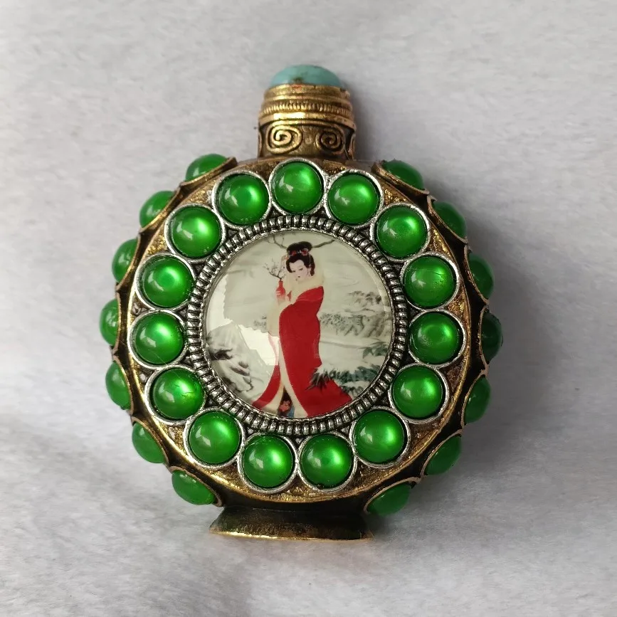 

Tibetan style pure copper snuff bottle with double-sided inlay and characteristic handicrafts for making beautiful women's snuf