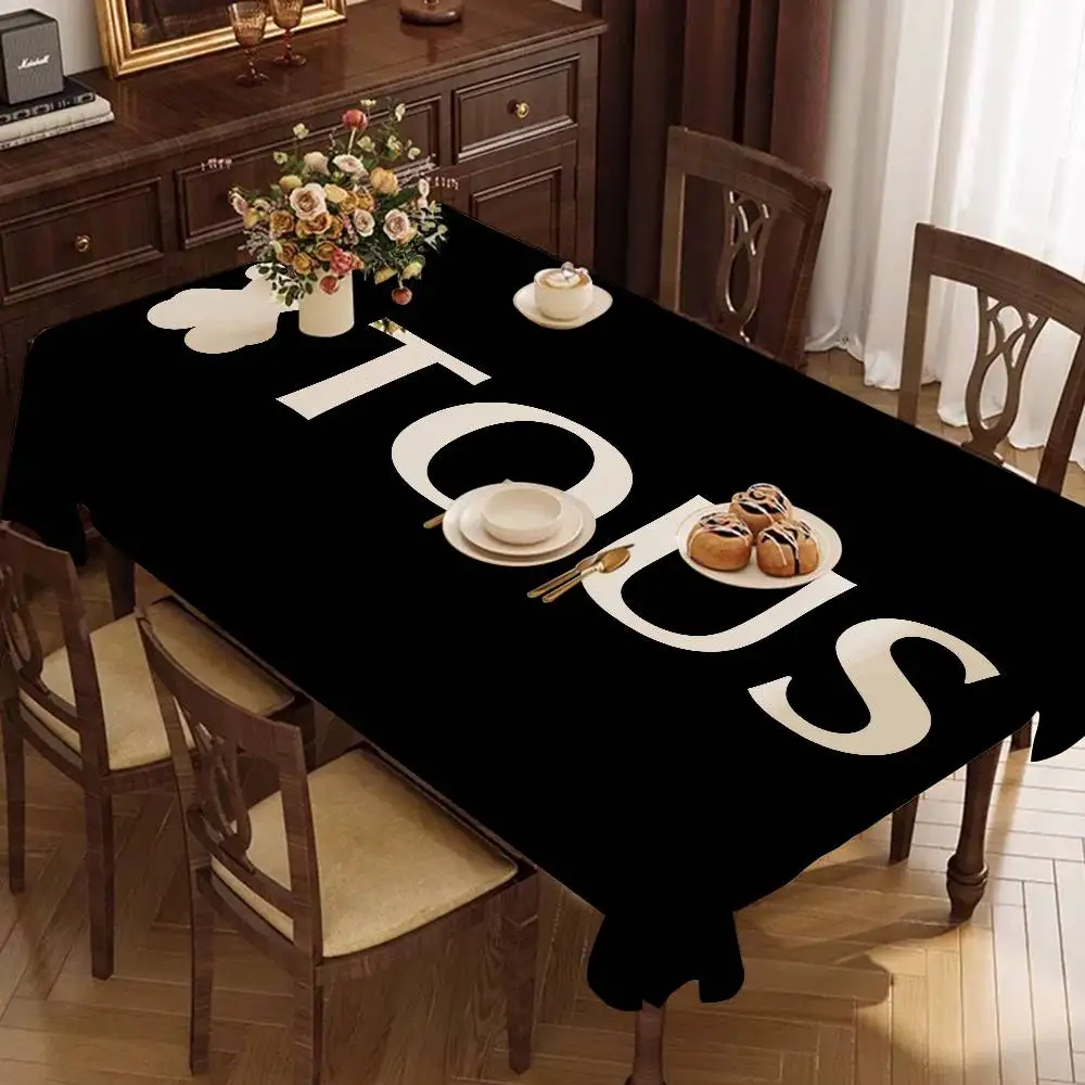 Mantel clásico con logotipo de joyería T-Tous, impermeable y a prueba de aceite, mantel decorativo a prueba de polvo para mesita de noche, mantel para mesa de café