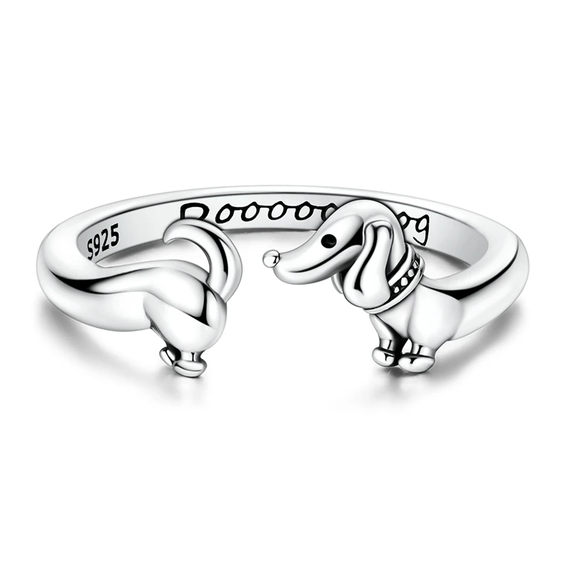 925 sterling silver adjustable open wrap ring featuring a detailed dachshund puppy design with engraved detailing.