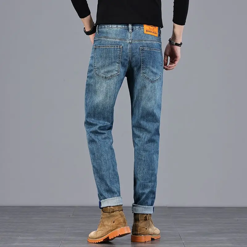 Jeans de ajuste fino elástico de negócios jovens para primavera e verão 2025 masculino casual confortável versátil calças de perna reta pequena