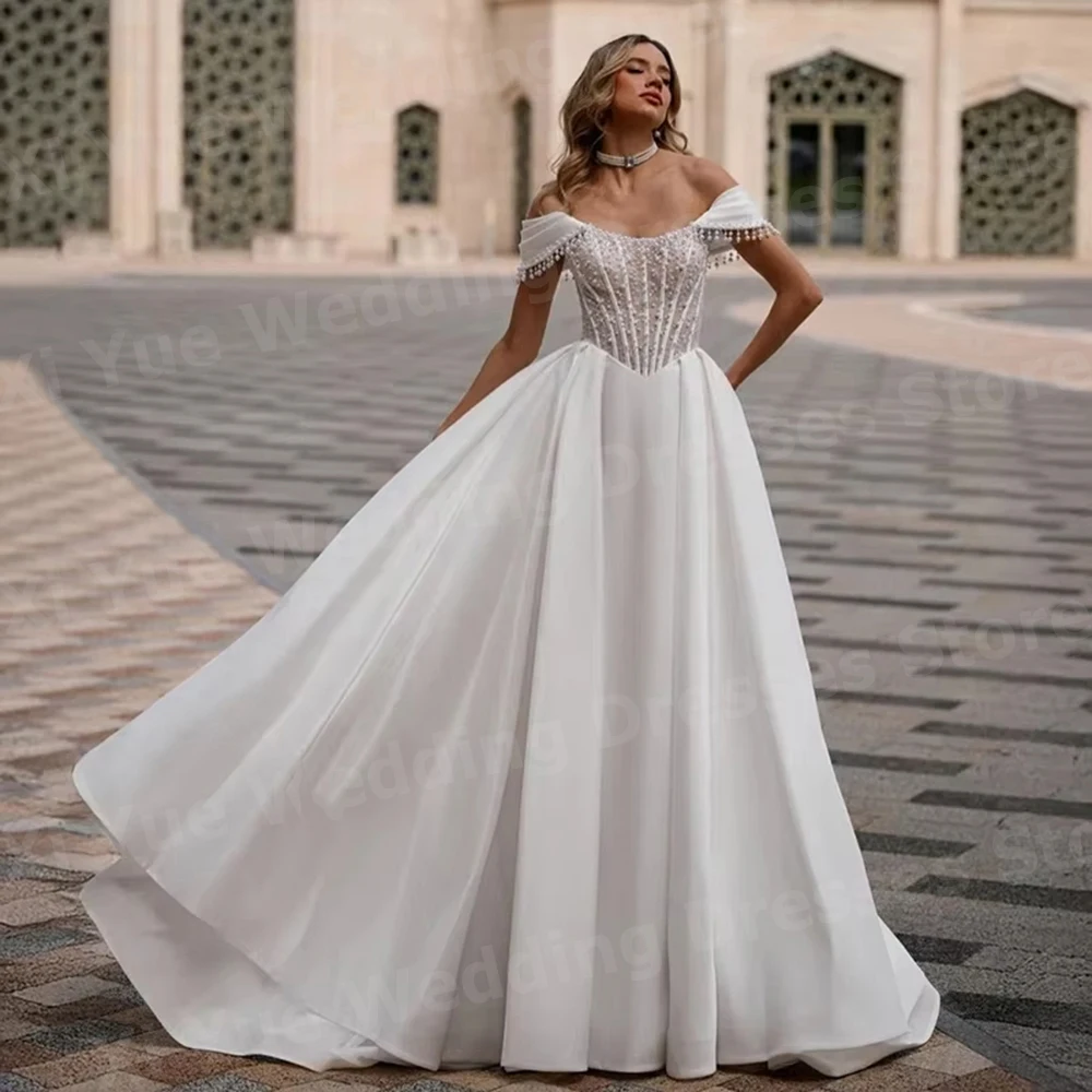 فساتين زفاف أنيقة على شكل حرف A للسيدات مكشوفة الكتف واللؤلؤ من Vestido De Novia بدون أكمام فساتين العروس مخصصة رداء De Mariée