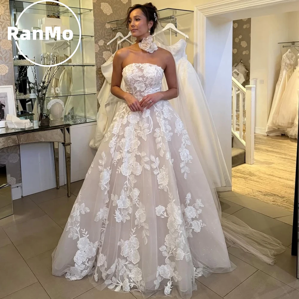 

Ranmo Modern Strapless A-line Lace Wedding Dresses Sleeveless Sparkly Applique Lace Pleat Bridal Gown Floor-Length Customized