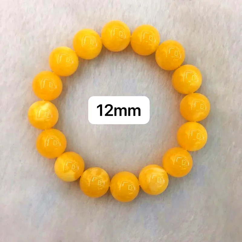 Natural second-generation bracelet with chicken oil yellow and floral patterns, Buddhist head charm, old amber prayer bead