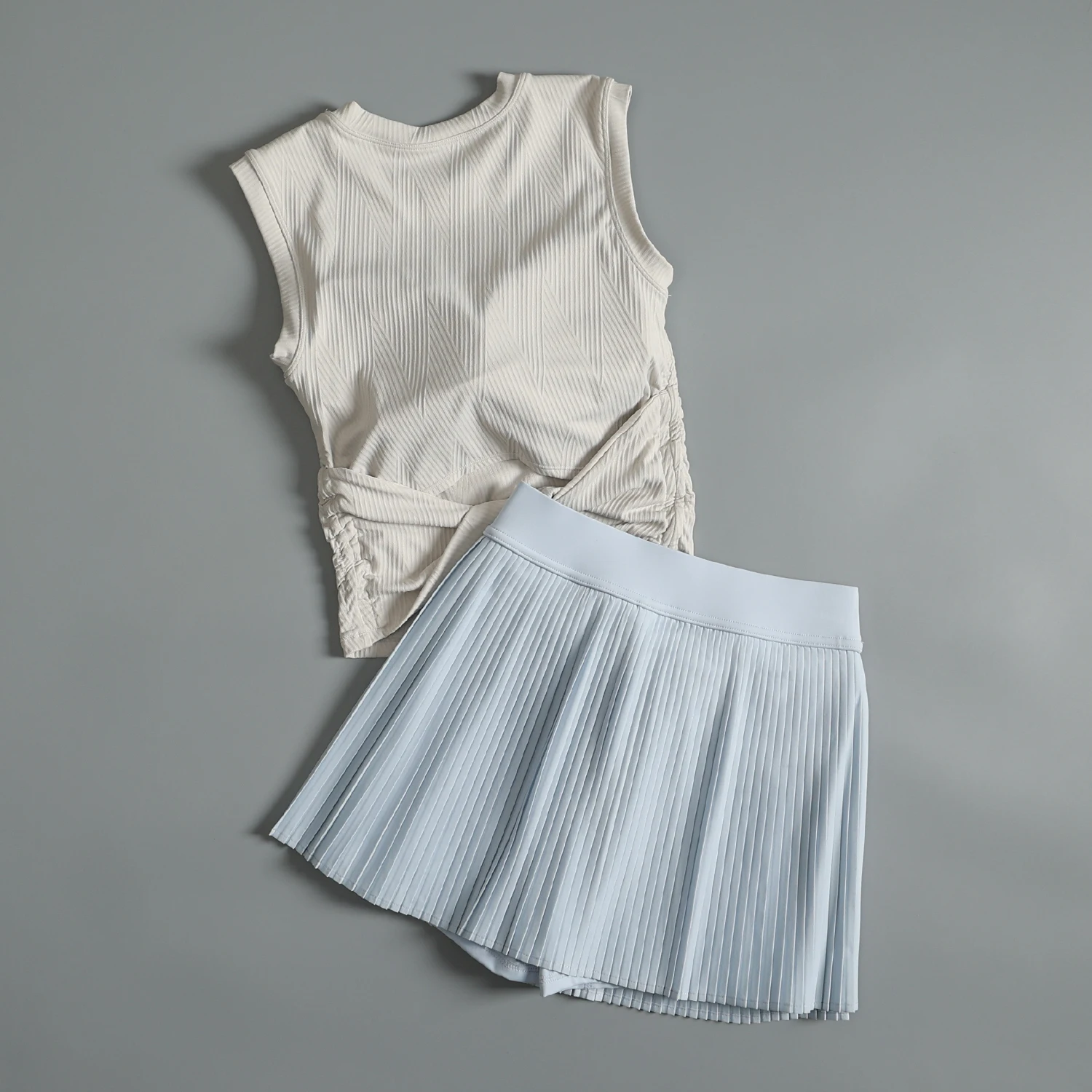 Traje deportivo de bádminton para mujer en verano, ropa de entrenamiento para correr de alta gama, ropa de secado rápido, Falda plisada deportiva de yoga antiexpuesta