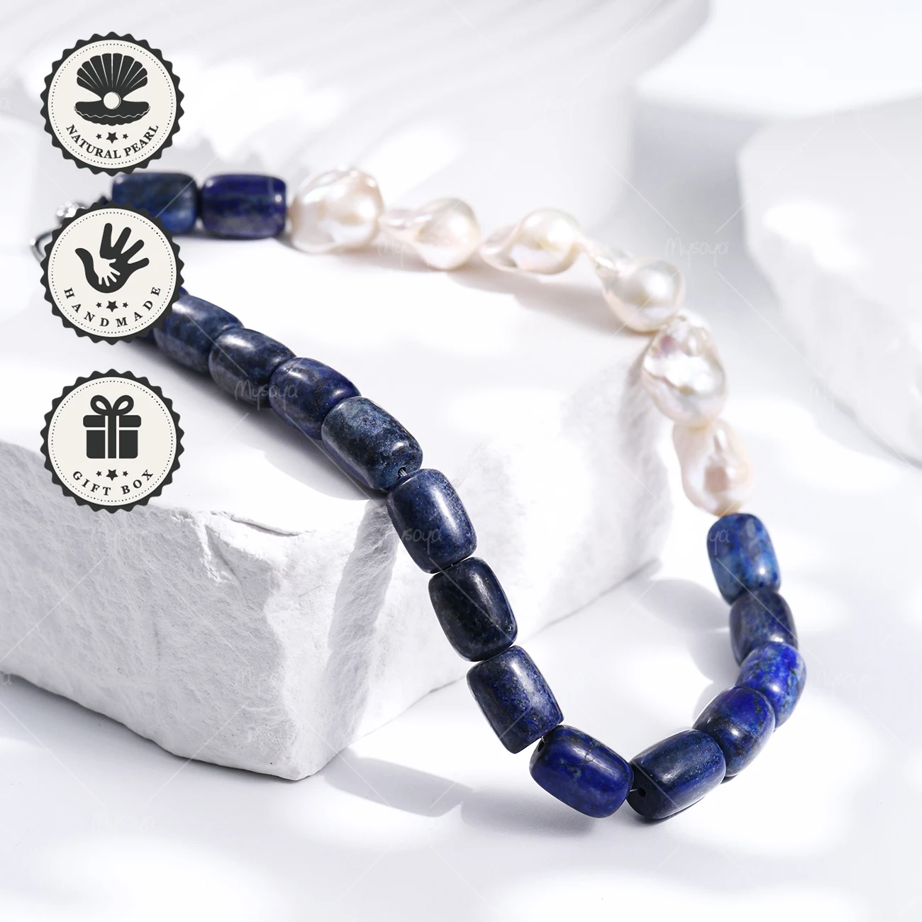 

Ожерелье MYSOYA из белого барочного жемчуга 12-15 мм с лазуритом, серебристой застежкой-узлом и подарочной коробкой. Подарок на день рождения, День святого Валентина, камень рождения июня.