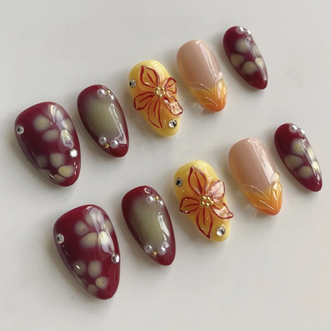 

24PCS Short Almond Press on Nails Retro Red Flower Yellow French Fake Nails for Women with Pearl Detachable False Nails Finished
