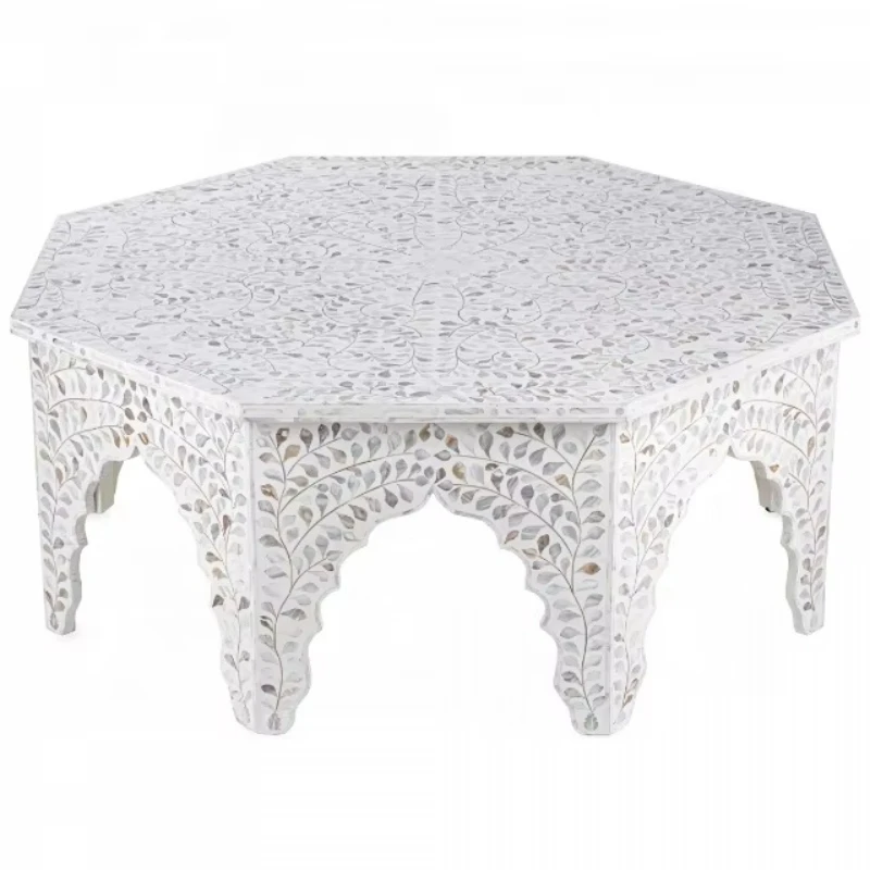 

Style coffee table, inlaid with mother of pearl, in traditional pattern