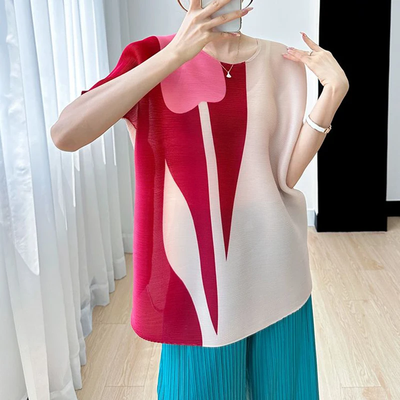 Wrinkle printed top for women in the summer of 2024, high-end and stylish, age reducing, loose round neck short sleeved shirt