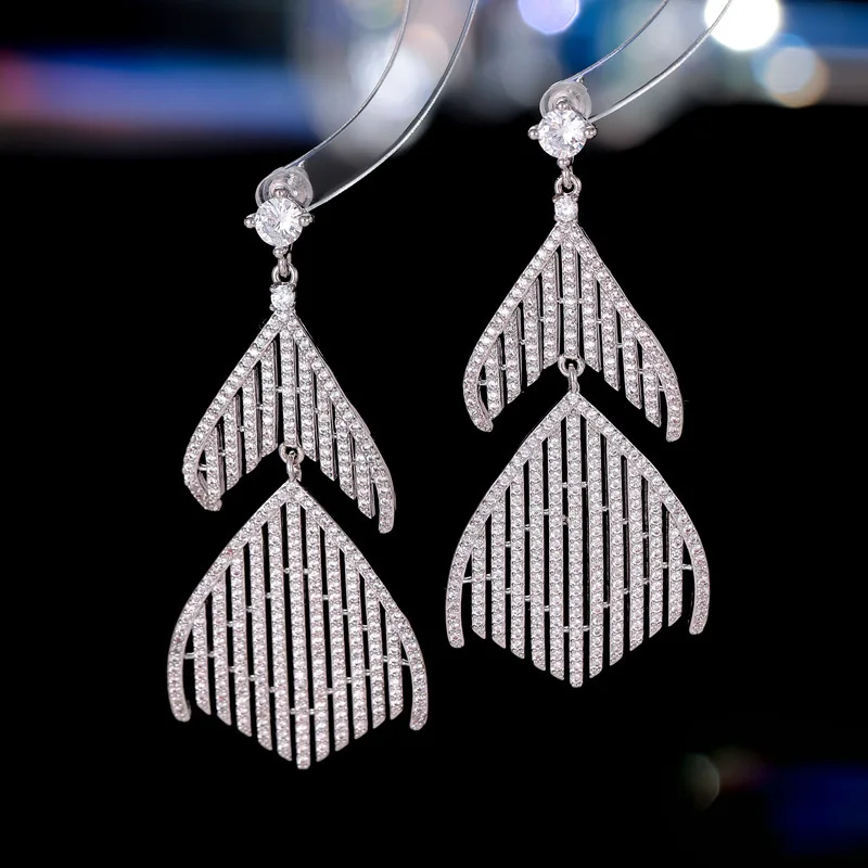

Fishtail tassel earrings s925 silver needle, exaggerated and unique gradient micro-inlaid zircon super flash evening earrings