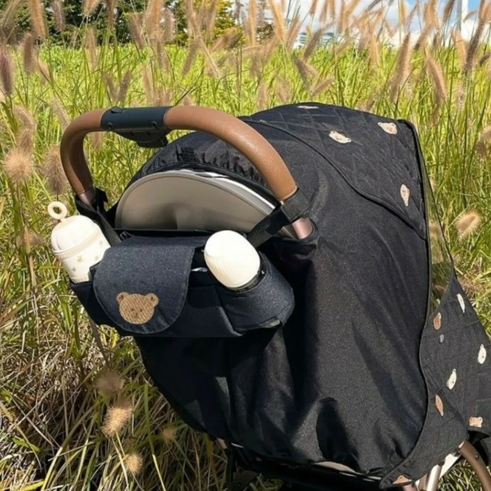 Bonito dos desenhos animados carrinho organizador saco urso pano pram saco de armazenamento garrafa de fraldas saco de mamãe carrinho de bebê saco de viagem