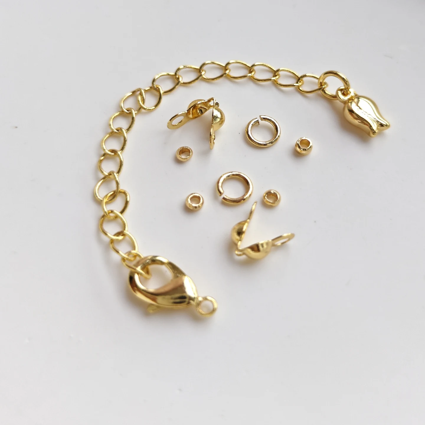 conjunto-de-acessorios-de-joalheria-de-moda-corrente-extensora-com-fecho-lagosta-banhada-a-ouro-18k-e-material-diy-para-orna