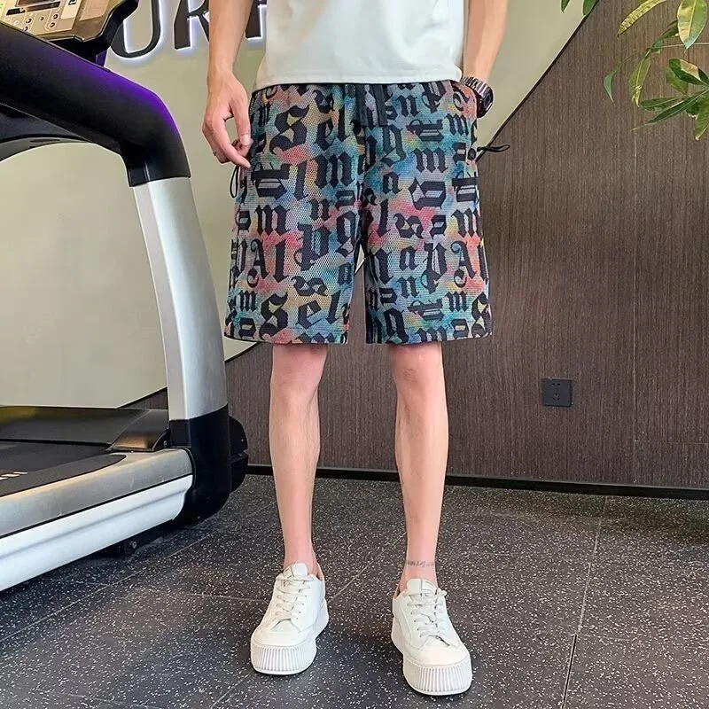 

Новые летние универсальные шорты, пляжные модные повседневные брюки с цветочным принтом и пятью точками, мужские облегающие большие шорты