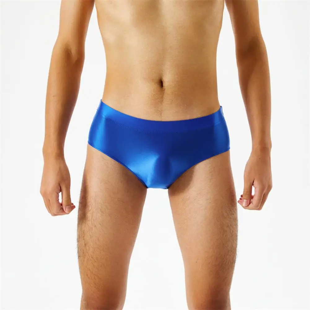 Calzoncillos elásticos para hombre, ropa interior Sexy sin costuras, brillante, de una pieza, Color sólido