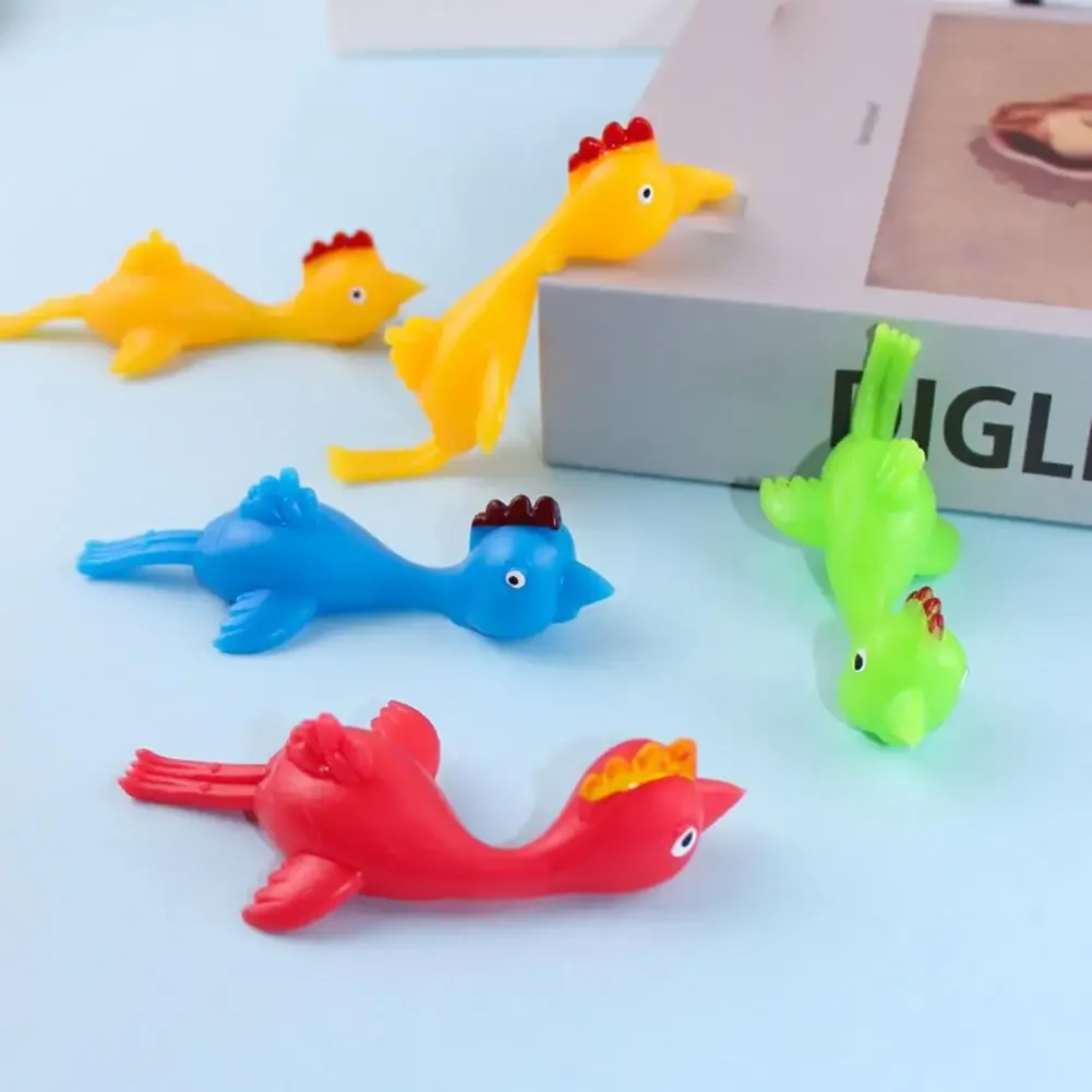 5-20pcs Novelty colour Catapulted Ejection Chicken Toy Light Rubber Finger Prank Flying Toy Slingshot Chicken Finger Toys Turkey