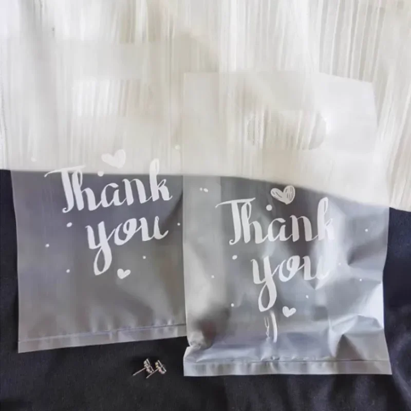 100 قطعة/الحزمة شكرا لك أكياس بلاستيكية التسوق الناقل حقيبة الحلوى كعكة الكوكيز التفاف الحقائب الزفاف استحمام الطفل حفلة الحسنات