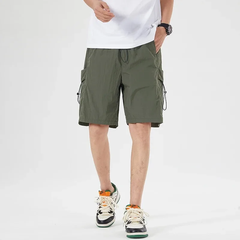 

Мужские и женские брюки-карго с несколькими карманами, свободные спортивные штаны с пятью точками на шнурке, летние уличные шорты, пляжные шорты 2025 г.