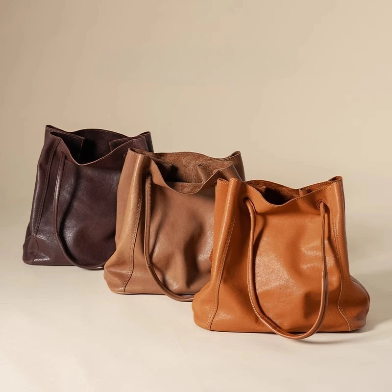 

A new soft leather bucket bag for women, a niche retro crossbody commuter large capacity tote bag