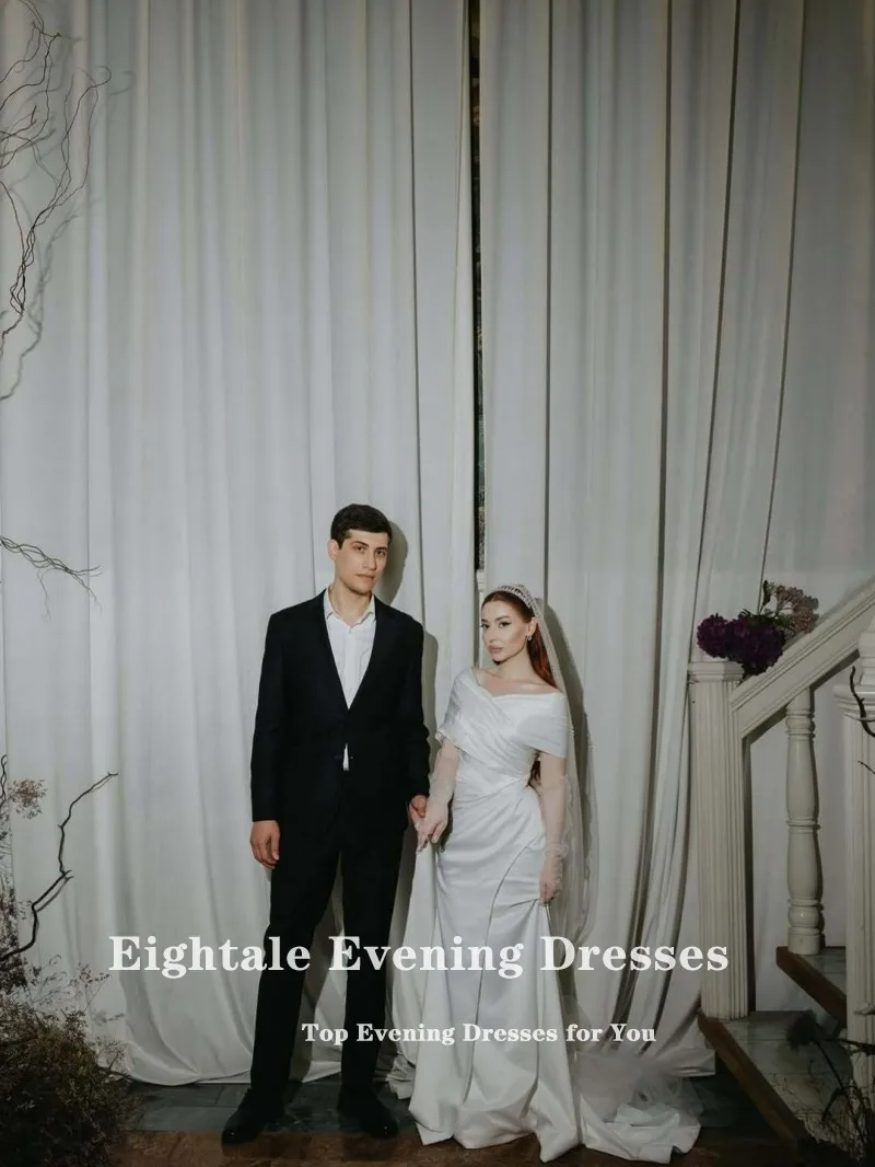 ชุดแต่งงานแบบอาหรับสีขาวงาช้าง ทรงเมอร์เมด ผ้าซาติน แบบเปิดไหล่ จีบระบาย  รับตัดตามสั่ง