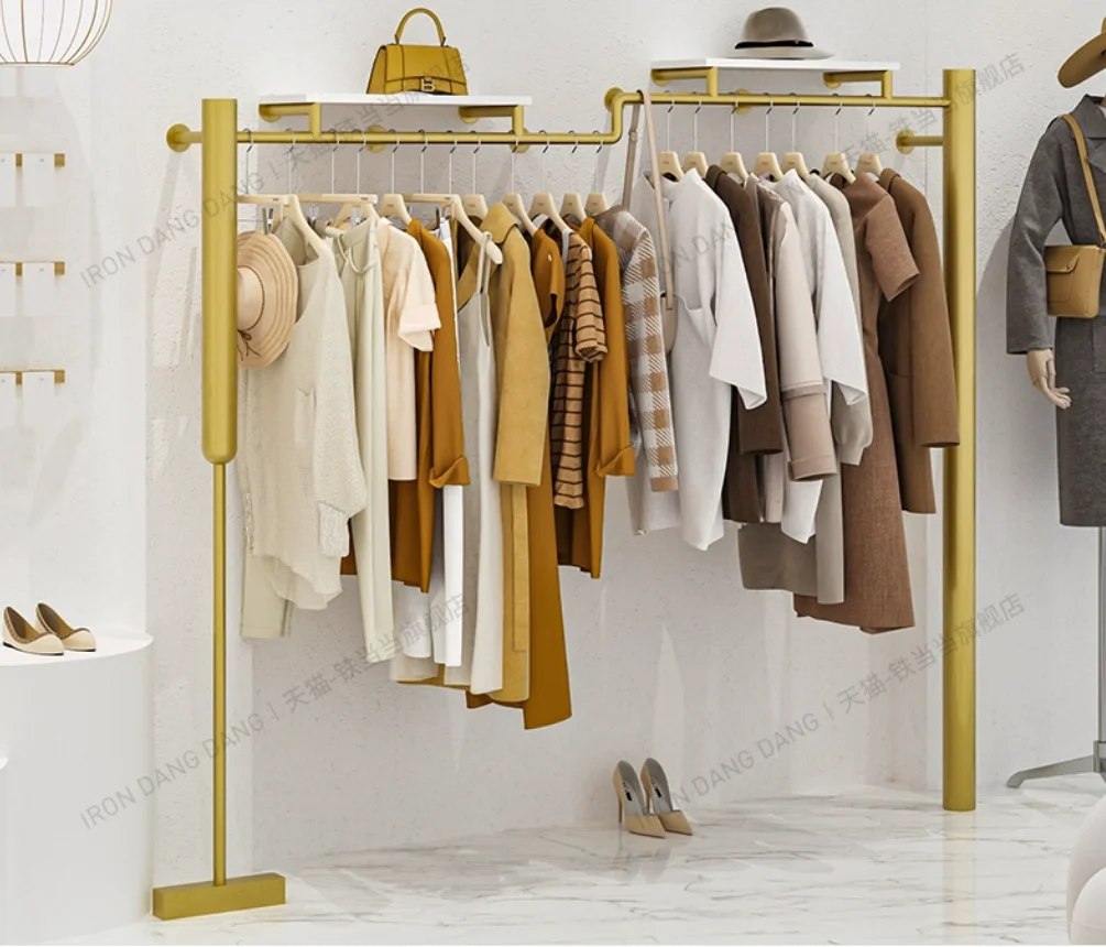 

Clothing display rack, clothing store, wrought iron gold shelves, high-end hanging racks on the wall, women's clothing store