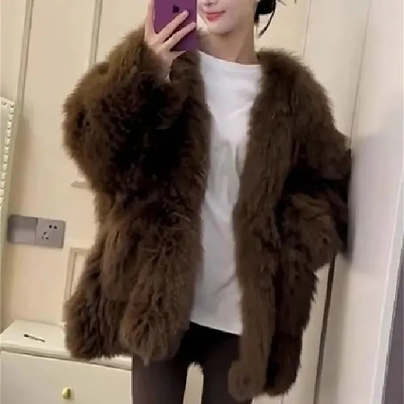 Chaqueta de felpa de manga larga para mujer europea, abrigo de piel sintética de Color sólido a la moda para mujer, prendas de vestir de piel de alta gama para Otoño e Invierno 2025