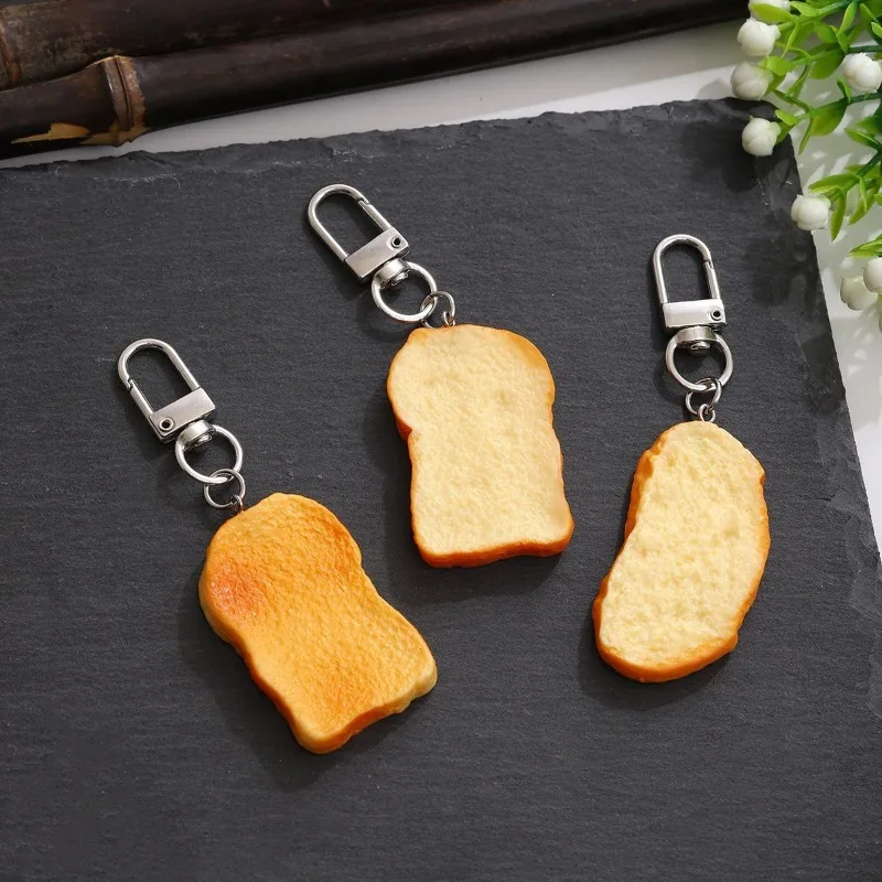 1pcs Simulated food keychain baked toast slices keyring creative PVC toast model food play DIY mode Car bag pendant Jewelry Gift