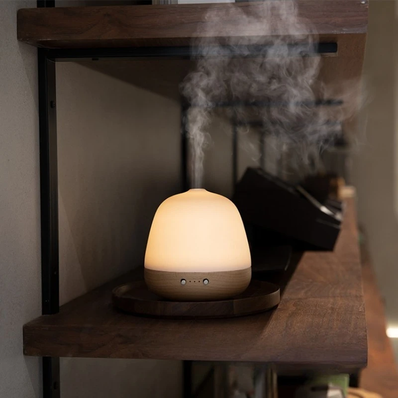 مرطب الزيوت العطرية للعلاج العطري، ضوء أصفر دافئ من السيراميك الإبداعي المنزلي بالموجات فوق الصوتية